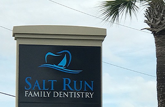Salt Run Family Dentistry sign in front of dental office building