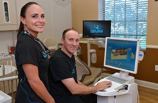 Dentists looking at digital smile design tools