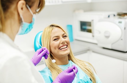 Patient laughing during preventive dentistry checkup visit