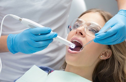 Dentist capturing intraoral images