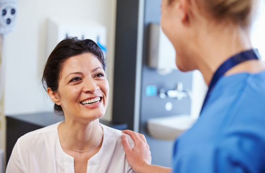 Augustine patient learning about oral health risks