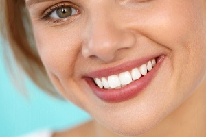Woman with beautiful smile thanks to cosmetic dentistry in St. Augustine