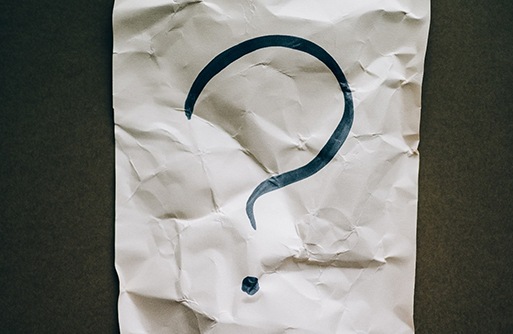 Question mark on wrinkled paper