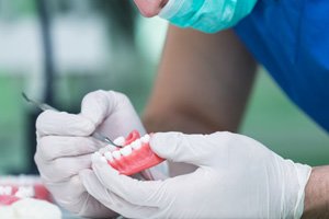 : a dental technician constructing dentures in St. Augustine 