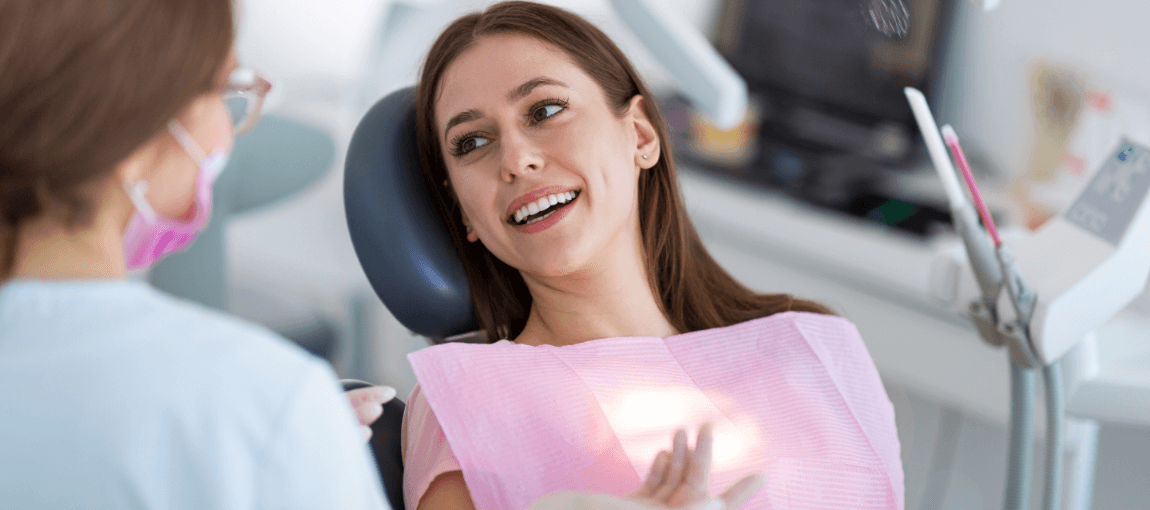 Saint Augustine dentist Sabrina Wall D D S talking to dental patient