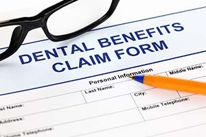 Insurance paperwork for the cost of dental emergencies in St. Augustine