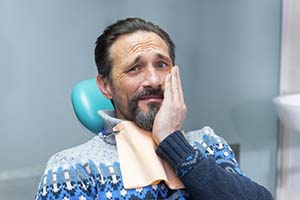 Man at dentist’s with toothache in St. Augustine