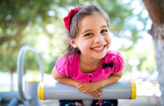 Child laughing after dental checkup