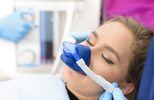 Patient with nitrous oxide dental sedation mask
