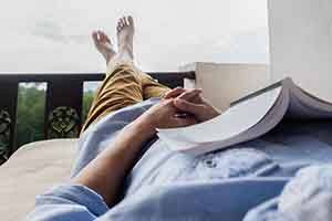 Patient in St. Augustine relaxing with Invisalign