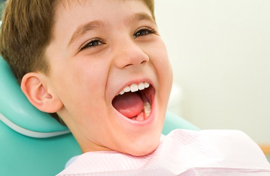 Young child at dentist for dental sealants