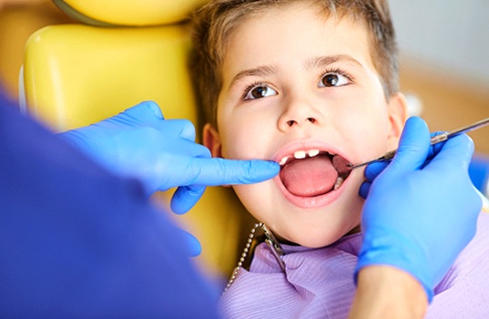 Young boy at preventive dentistry appointment