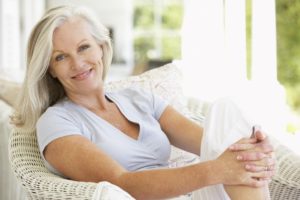 Older woman with dental implants