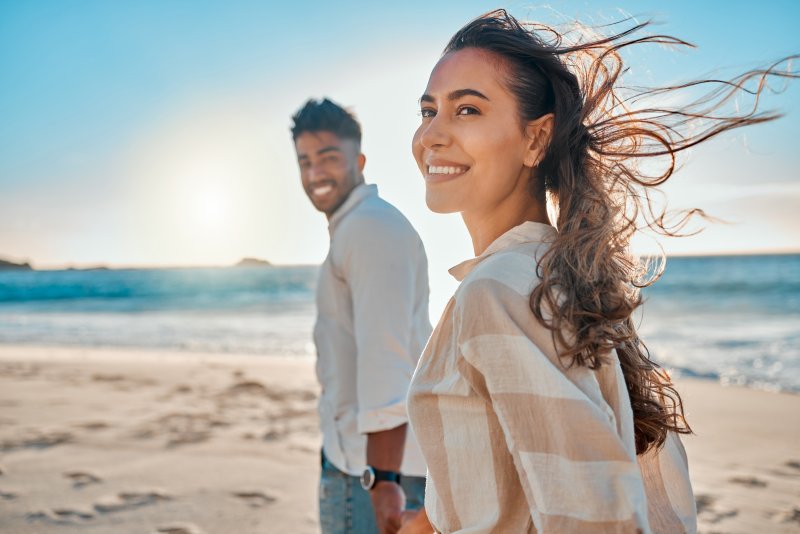 Person smiling in the summer sun