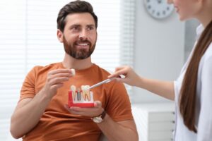 Man at his dental implant consultation